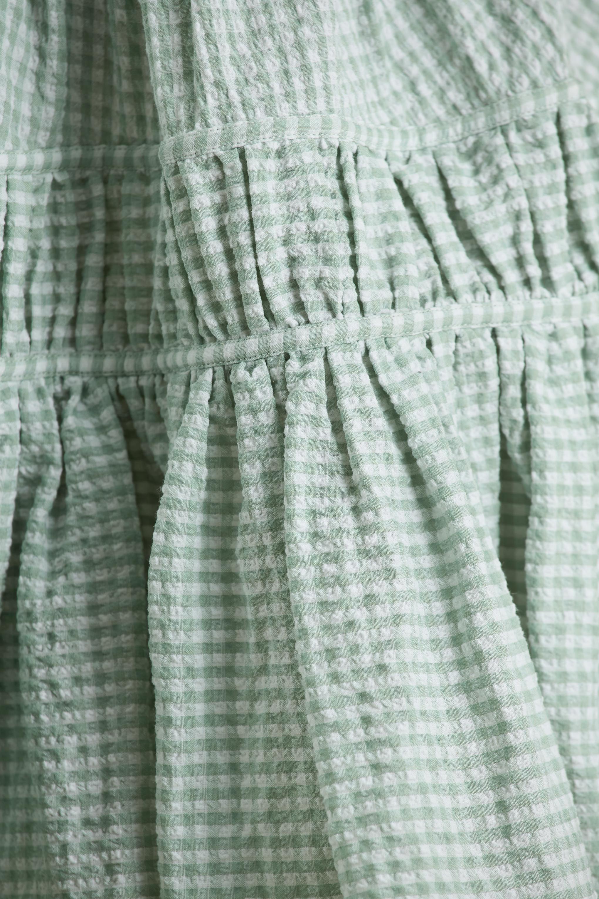 Laurelle | Green Extreme Plunge-Neck Mini Dress With Ruffling Detail - Image 7