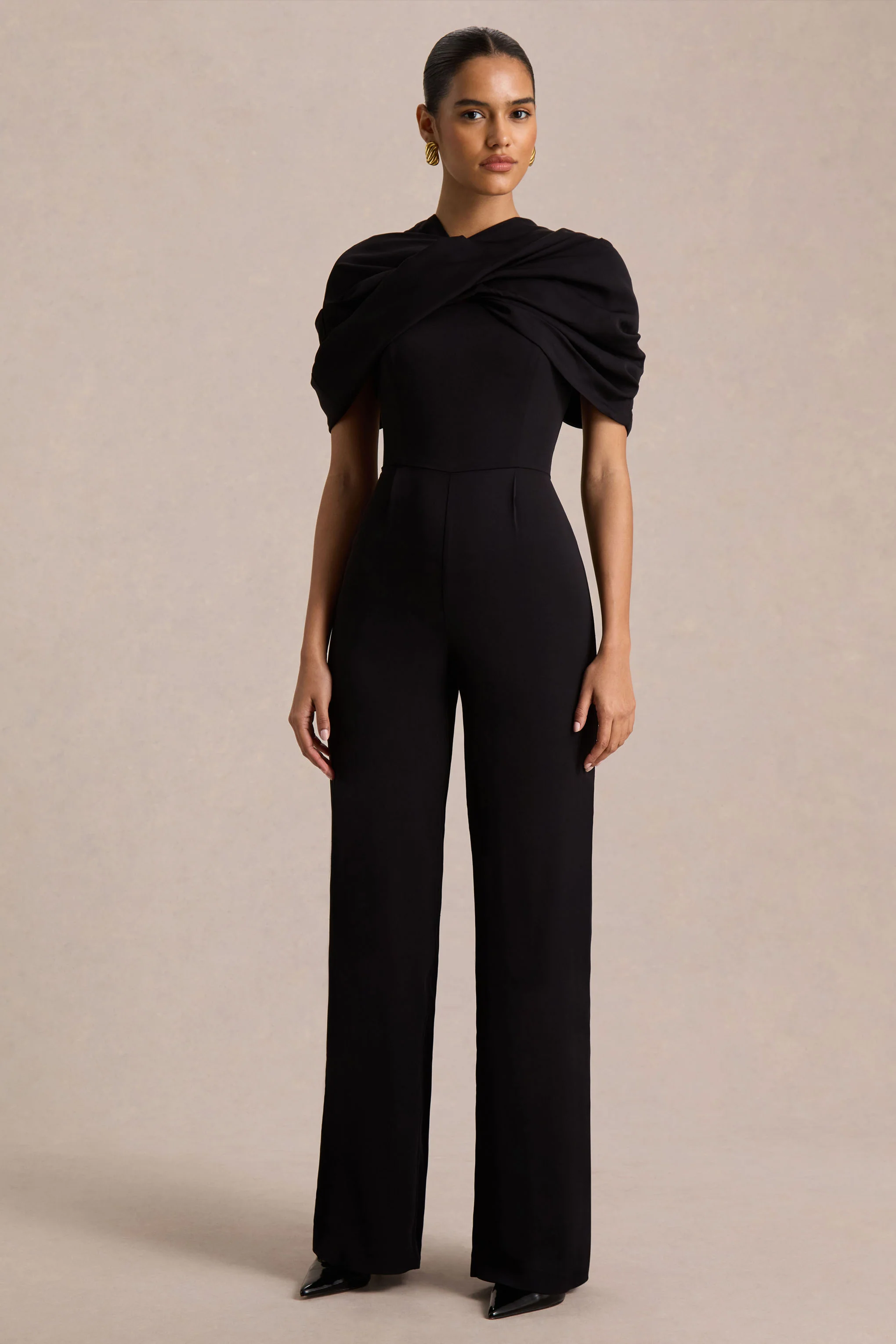 Raquel | Black Asymmetric-Neck Jumpsuit With Twisted Cape Detail - Image 4